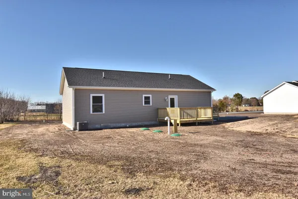 a house view with a backyard space