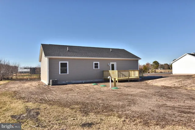 a house view with a backyard space