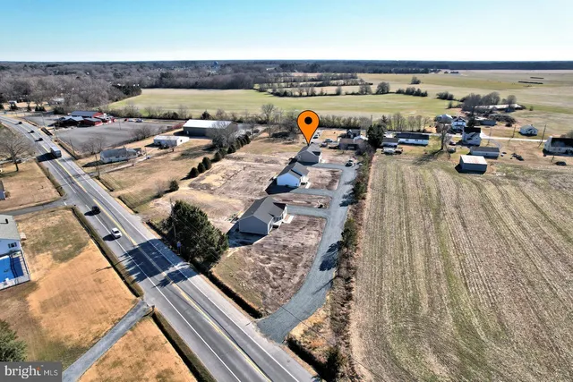 an aerial view of a building with outdoor space
