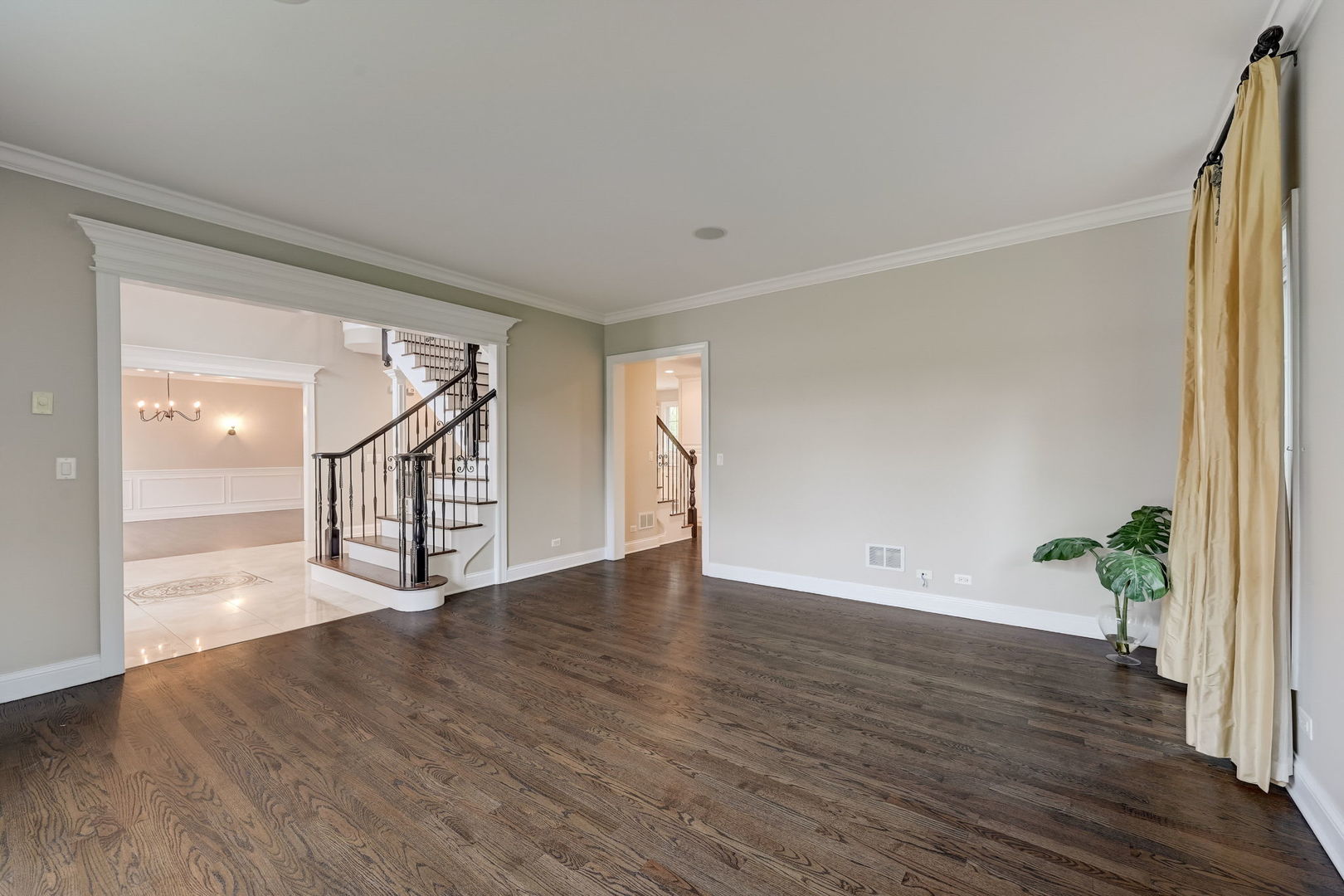 403 Old Mill Circle Lincolnshire, IL 60069 - Photo 3 of 4 a view of an empty room with wooden floor and a window