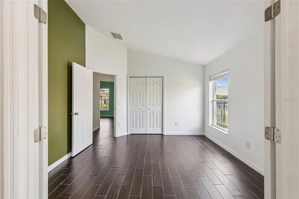 a view of livingroom with hardwood floor and hallway