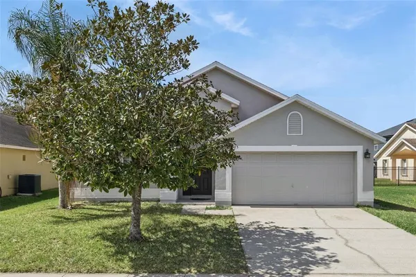 a front view of house with yard