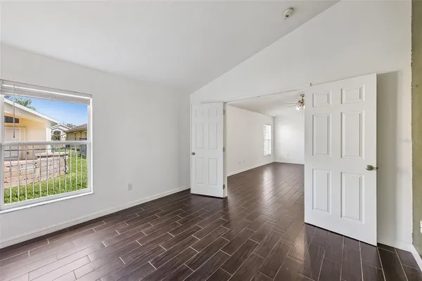 a view of livingroom with hardwood floor and hallway