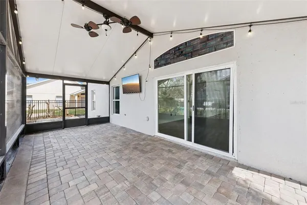 a view of a glass door with a balcony