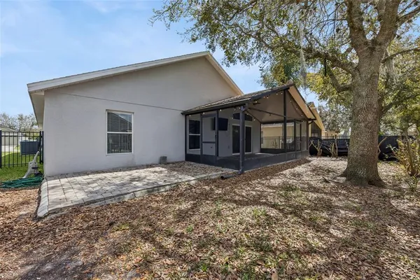 a house with trees in front of it