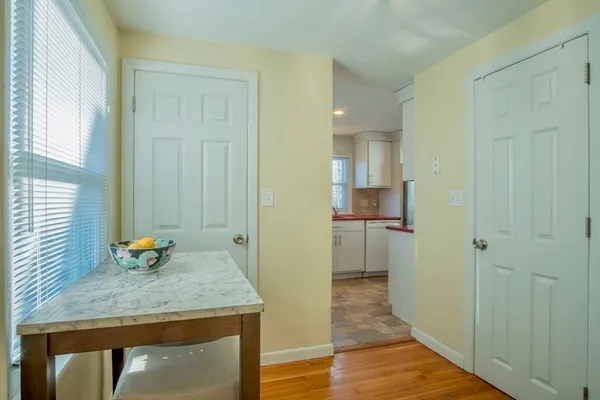 a kitchen with a stove a sink and a microwave