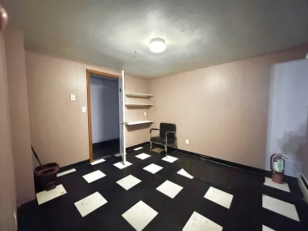 a view of a bathroom from the hallway