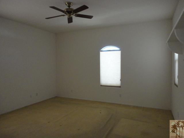 49473 Wayne Street Indio, CA 92201 - Photo 16 of 20 an empty room with a window