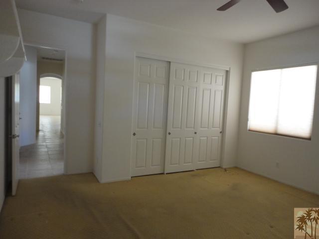 49473 Wayne Street Indio, CA 92201 - Photo 17 of 20 a view of an empty room and a window