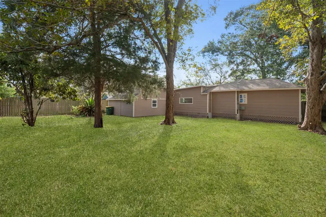 a view of a house with a tree and a tree