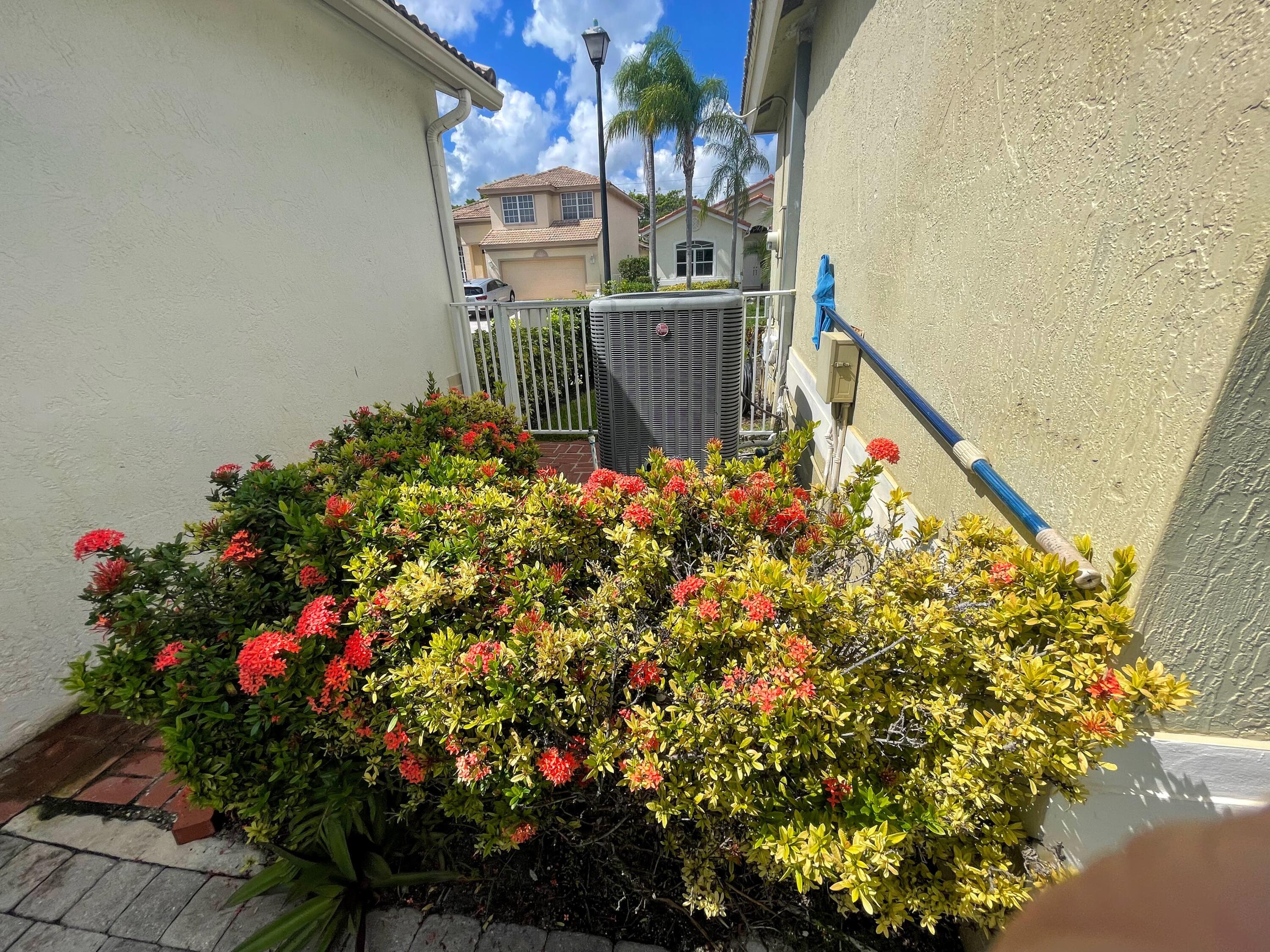 7060 Northwest Turtle Walk Boca Raton, FL 33487 - Photo 12 of 51 side yard