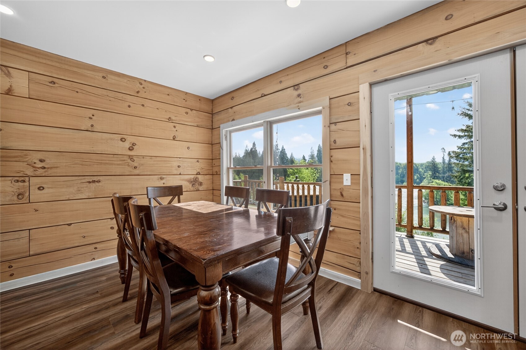180 Carr Road Randle, WA 98377 - Photo 17 of 40 a view of a dining room with furniture window and wooden floor