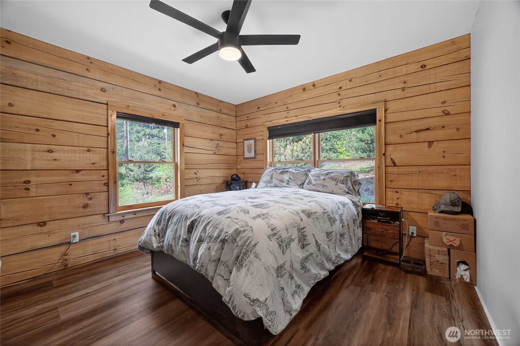 180 Carr Road Randle, WA 98377 - Photo 22 of 40 a bed sitting in a spacious bedroom next to a window