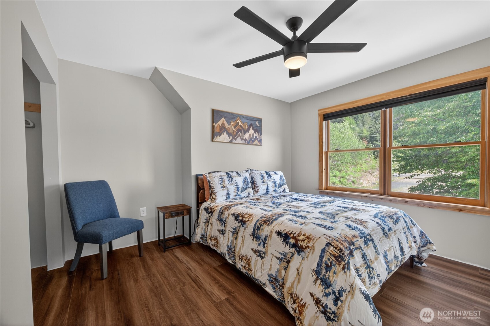 180 Carr Road Randle, WA 98377 - Photo 29 of 40 a bedroom with a bed and a large window