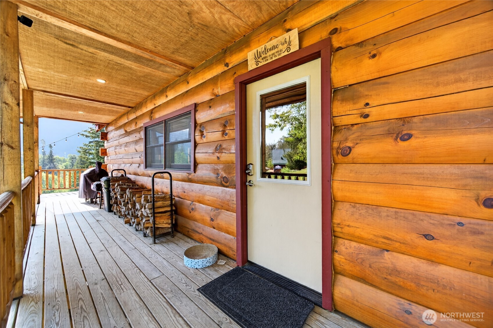180 Carr Road Randle, WA 98377 - Photo 3 of 40 a balcony with wooden floor