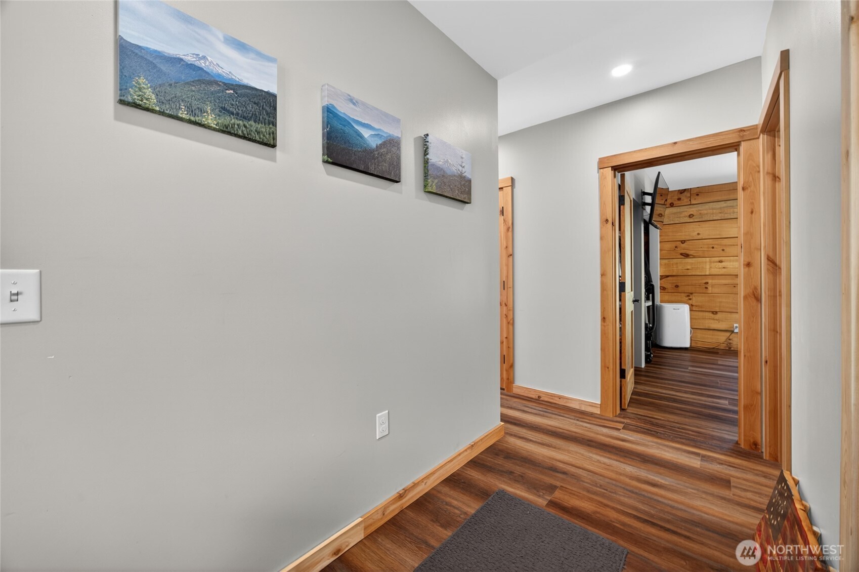 180 Carr Road Randle, WA 98377 - Photo 8 of 40 a view of a hallway with wooden floor