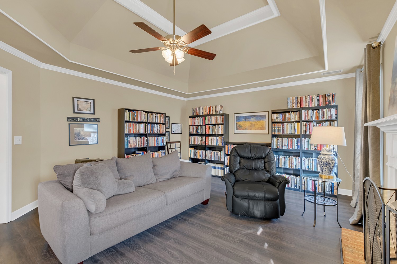 4002 Marion Drive Spring Hill, TN 37174 - Photo 30 of 44 a living room with furniture and a bookshelf