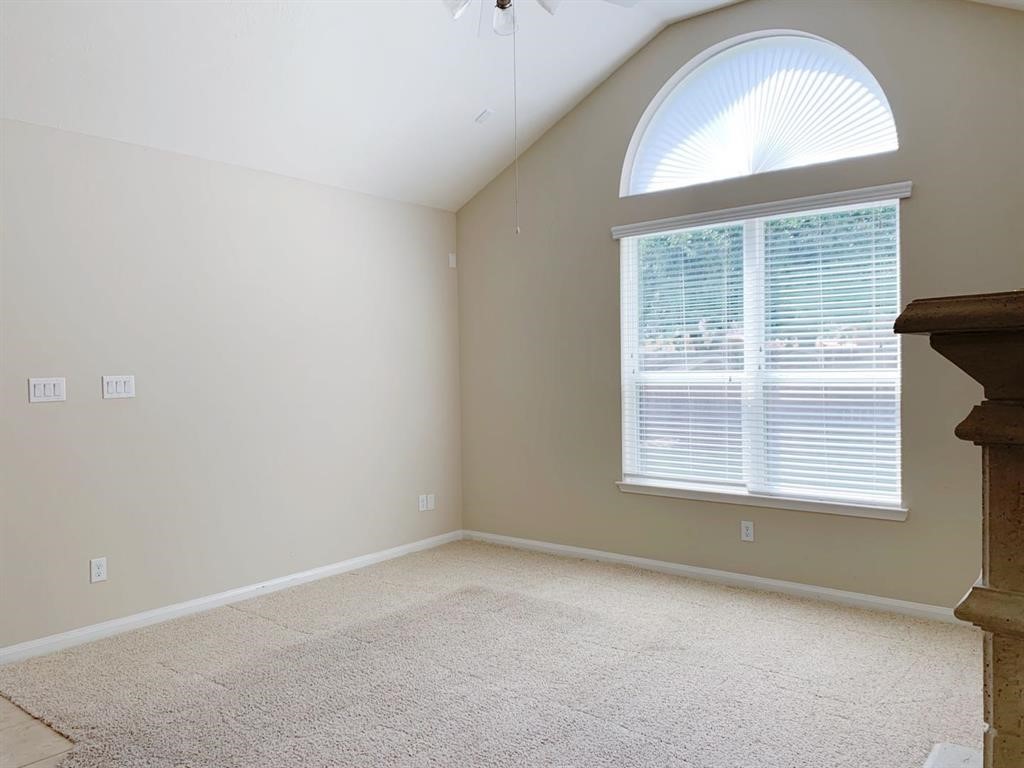 24418 Ranchwood Springs Lane Katy, TX 77494 - Photo 14 of 29 an empty room with a window