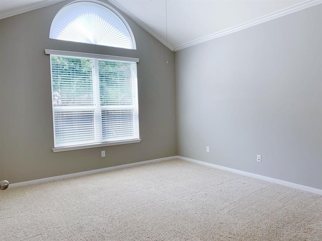 24418 Ranchwood Springs Lane Katy, TX 77494 - Photo 15 of 29 a view of an empty room with a window