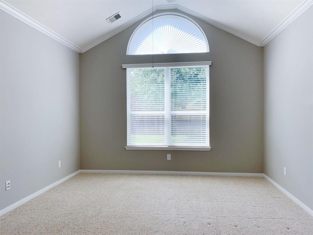 24418 Ranchwood Springs Lane Katy, TX 77494 - Photo 16 of 29 an empty room with a window