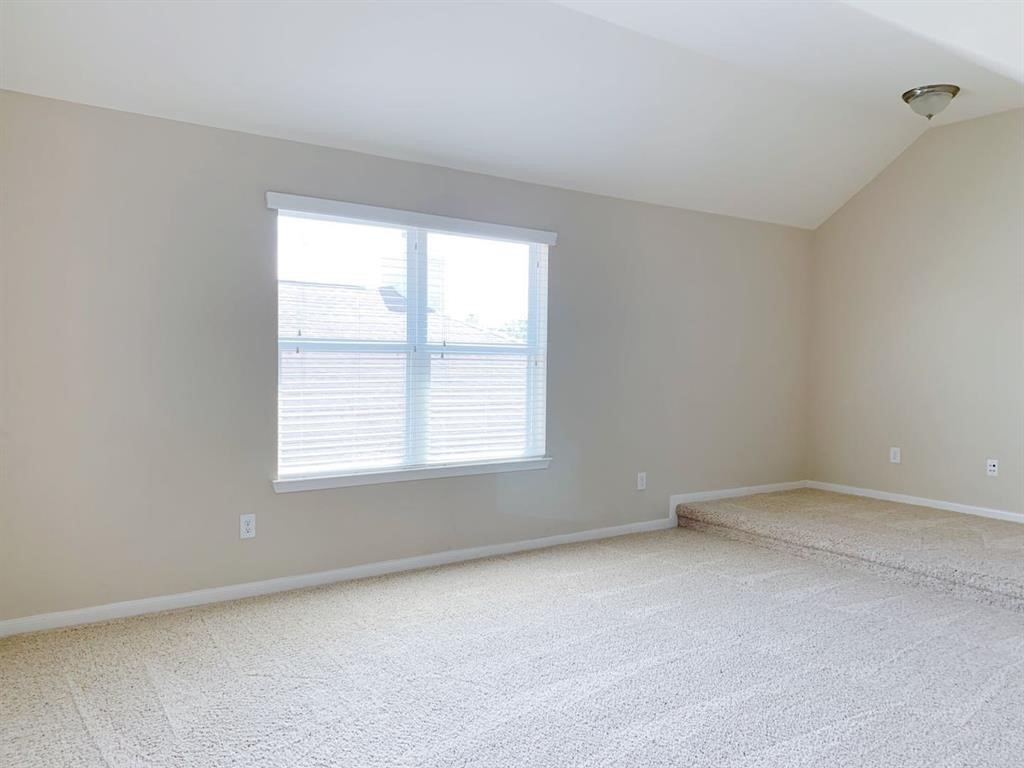 24418 Ranchwood Springs Lane Katy, TX 77494 - Photo 22 of 29 an empty room with a window