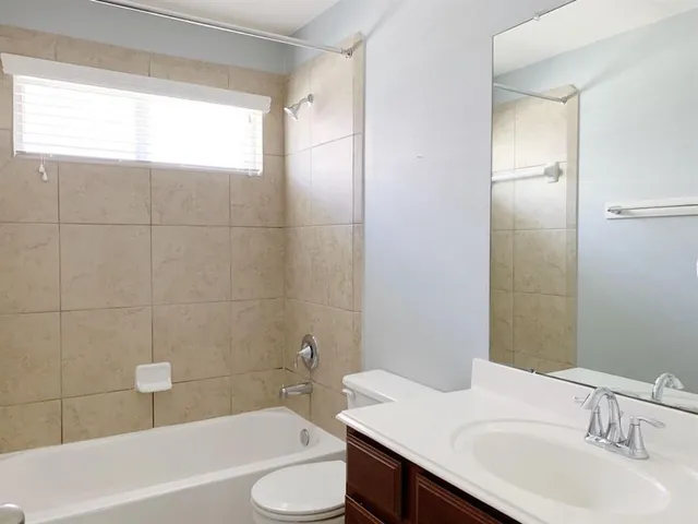 a bathroom with a sink and a bathtub