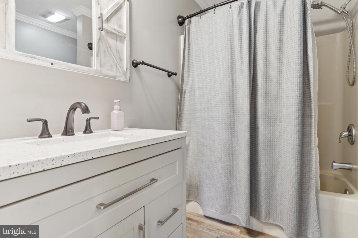 20 Cox Road Colora, MD 21917 - Photo 15 of 38 a bathroom with a sink and a mirror