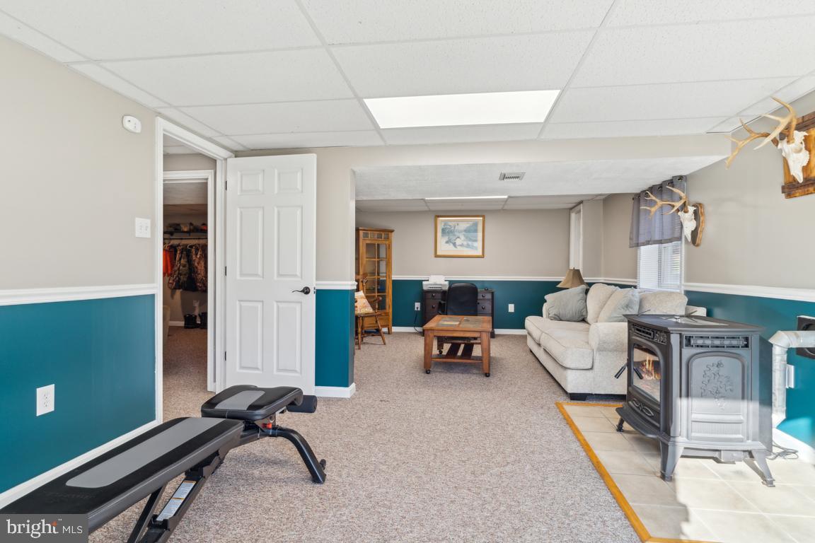 20 Cox Road Colora, MD 21917 - Photo 22 of 38 a living room with furniture windows and a flat screen tv