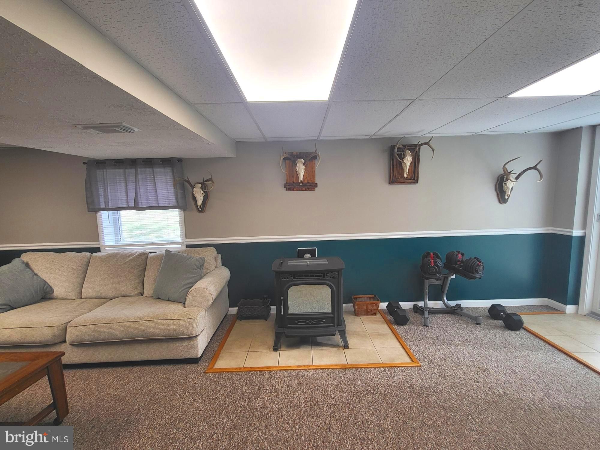 20 Cox Road Colora, MD 21917 - Photo 23 of 38 a living room with a couch and dresser