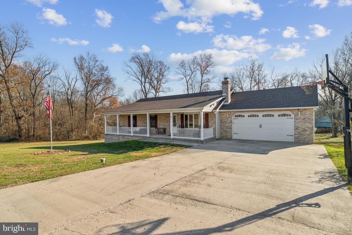 20 Cox Road Colora, MD 21917 - Photo 3 of 38 a front view of a house with garden