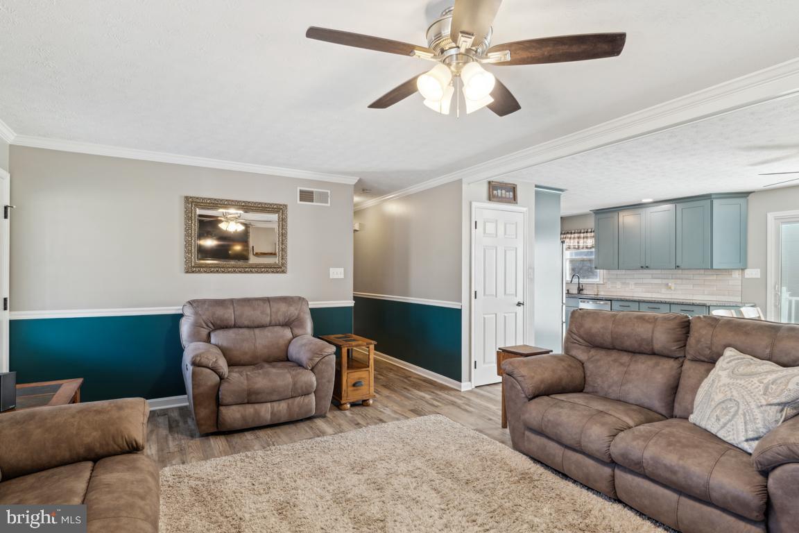 20 Cox Road Colora, MD 21917 - Photo 5 of 38 a living room with furniture and a view of kitchen