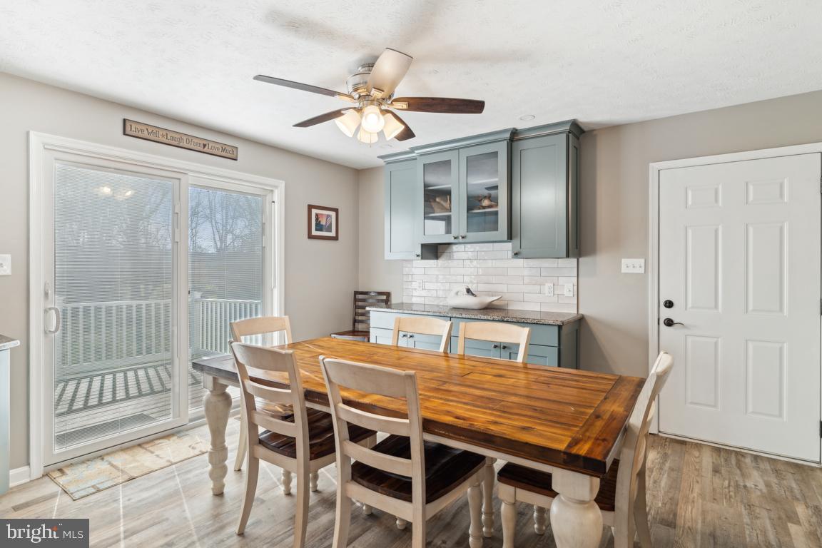 20 Cox Road Colora, MD 21917 - Photo 6 of 38 a dining room with furniture a chandelier and wooden floor