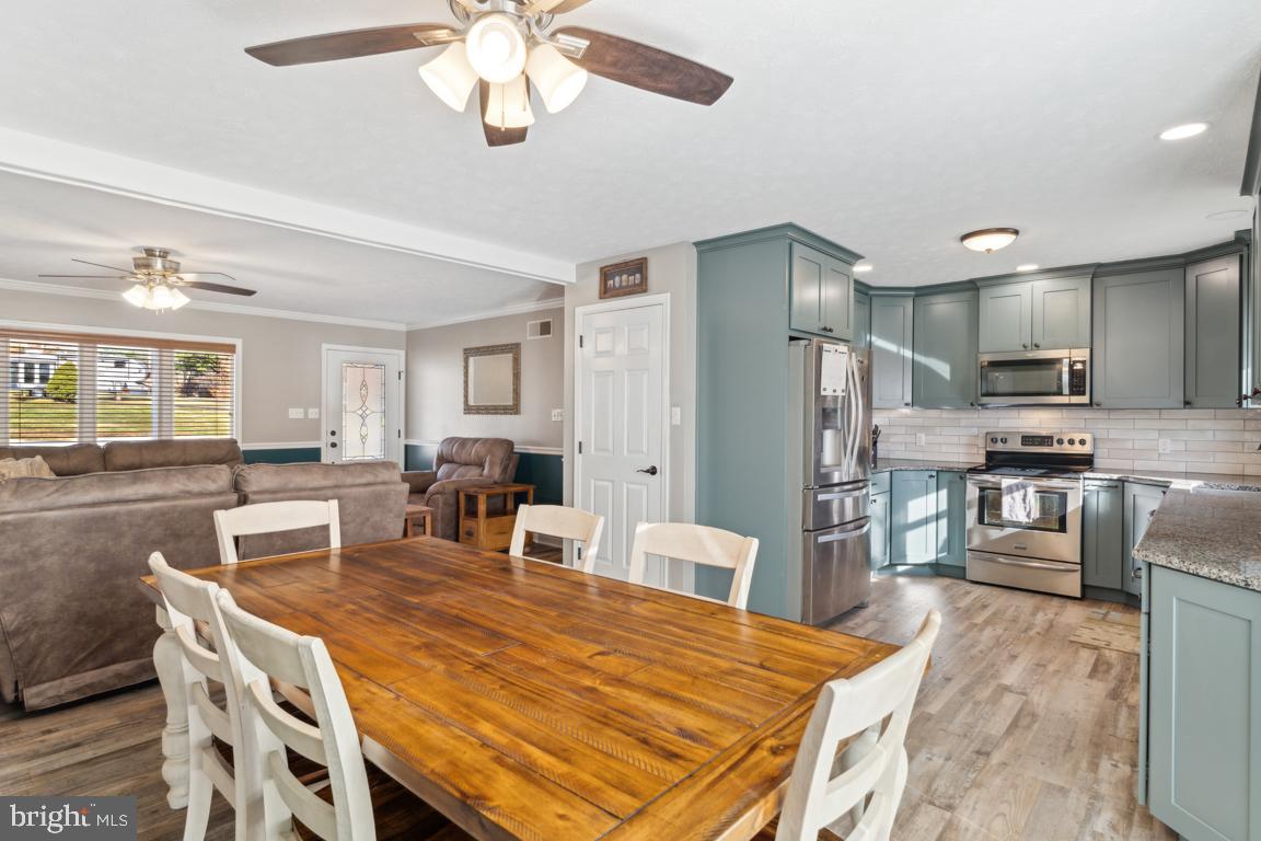 20 Cox Road Colora, MD 21917 - Photo 7 of 38 a large kitchen with a table and chairs