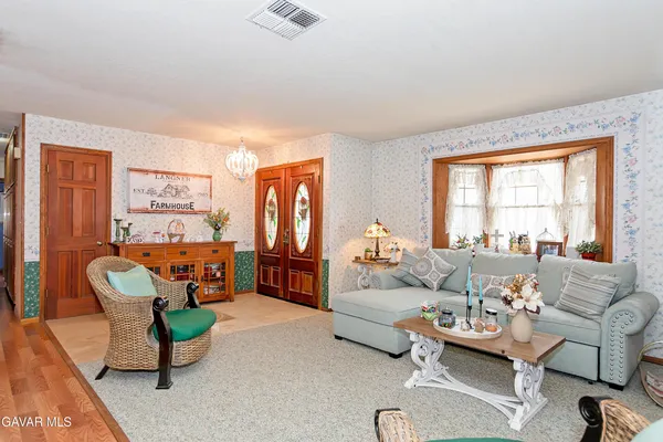 a kitchen with stainless steel appliances granite countertop a stove and a refrigerator