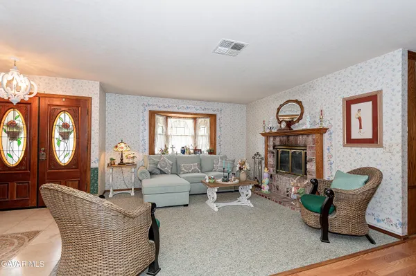a kitchen with lots of appliances and cabinets