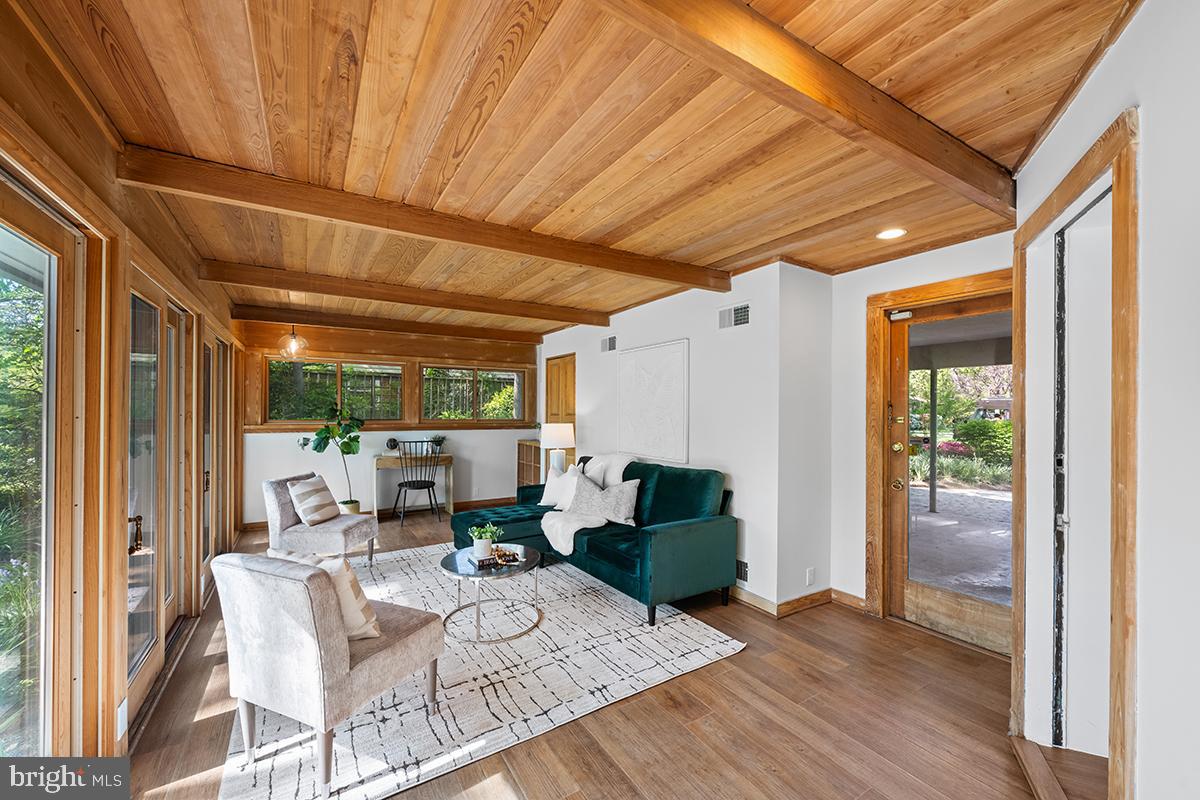 3430 Blair Road Falls Church, VA 22041 - Photo 14 of 40 a living room with furniture a large window with outer view