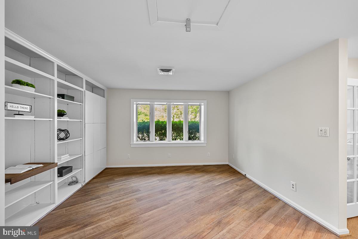 3430 Blair Road Falls Church, VA 22041 - Photo 17 of 40 wooden floor in an empty room with a window