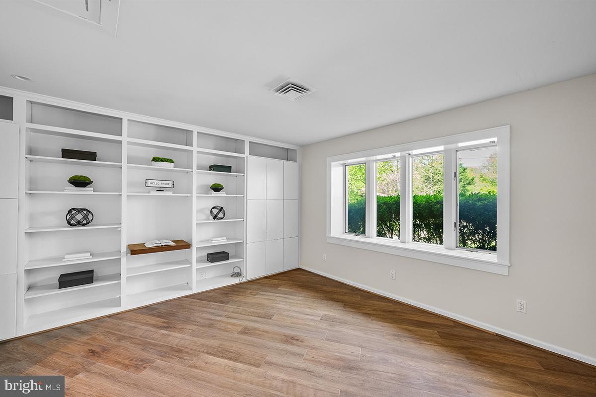 3430 Blair Road Falls Church, VA 22041 - Photo 18 of 40 wooden floor in an empty room with a window