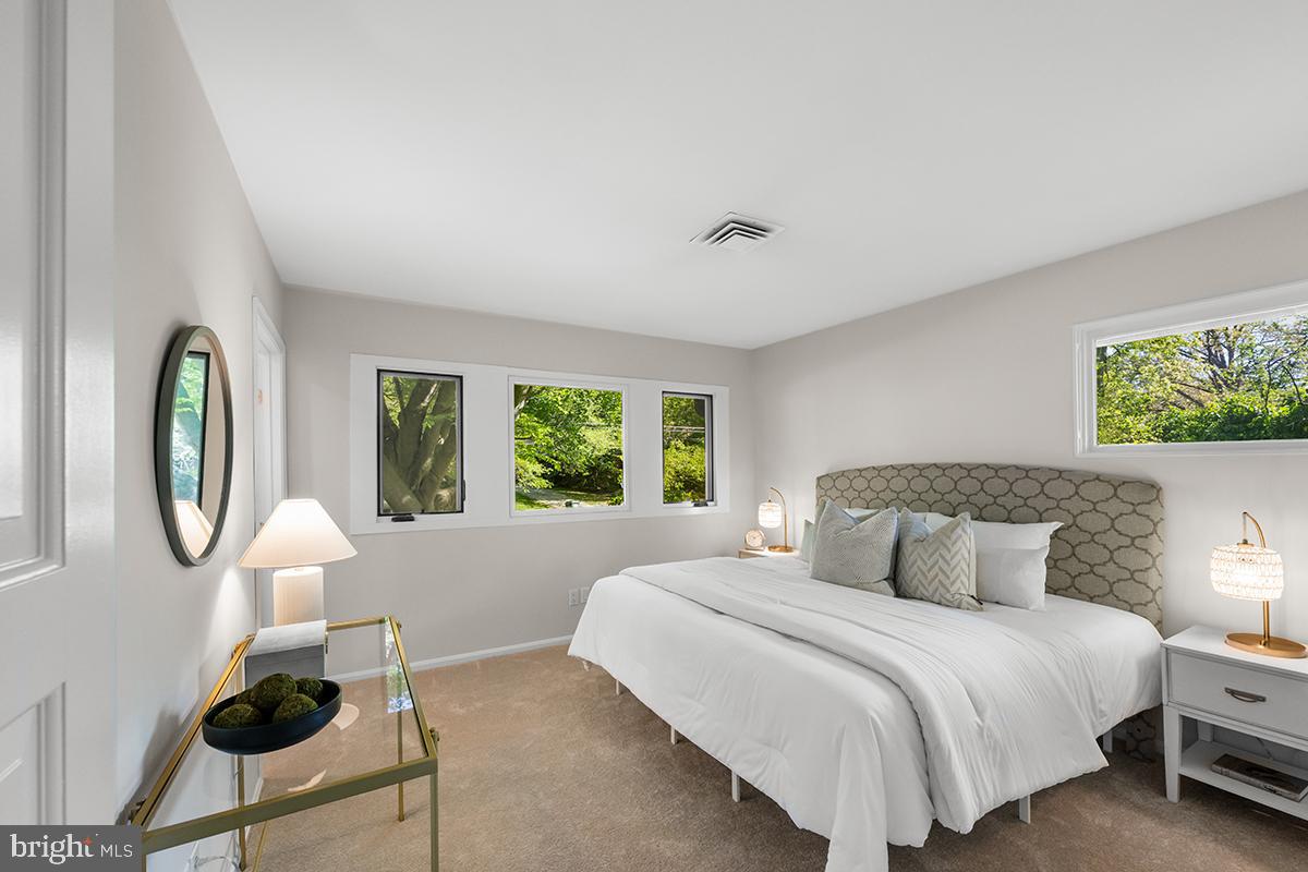 3430 Blair Road Falls Church, VA 22041 - Photo 22 of 40 a bedroom with a bed chair and window