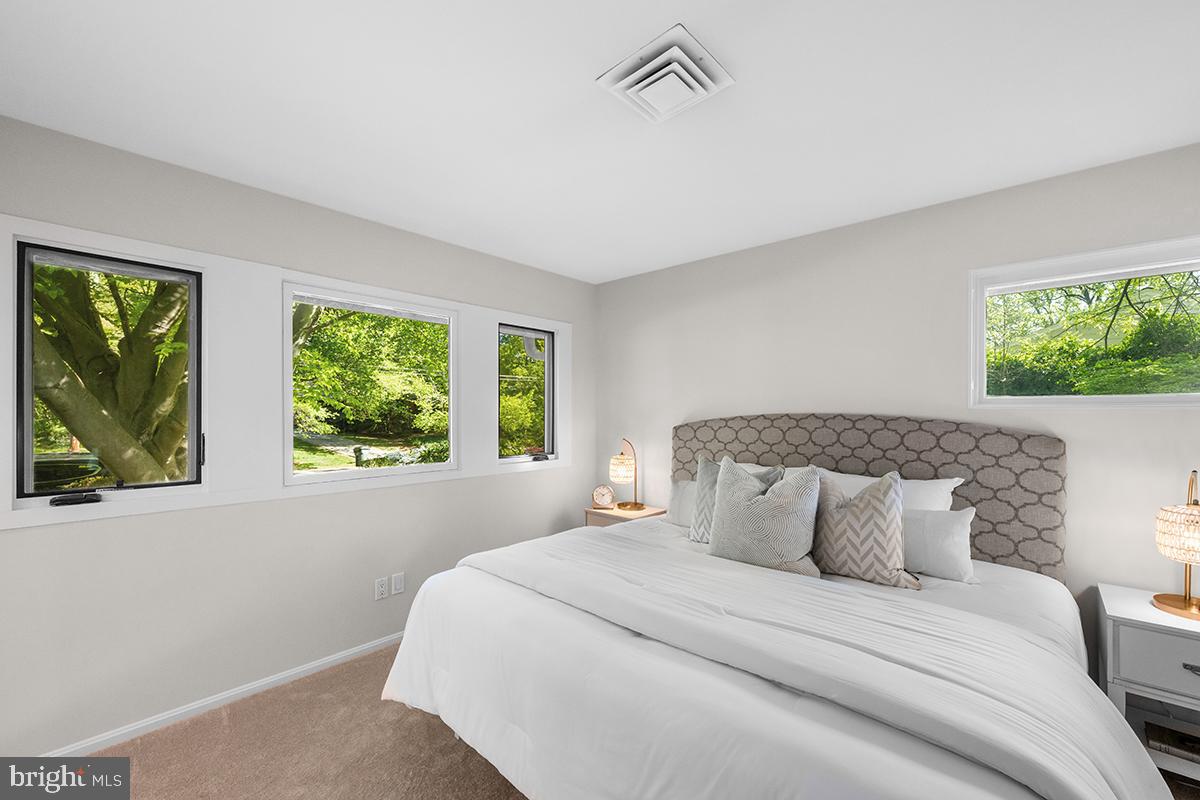 3430 Blair Road Falls Church, VA 22041 - Photo 23 of 40 a bedroom with a bed and a window