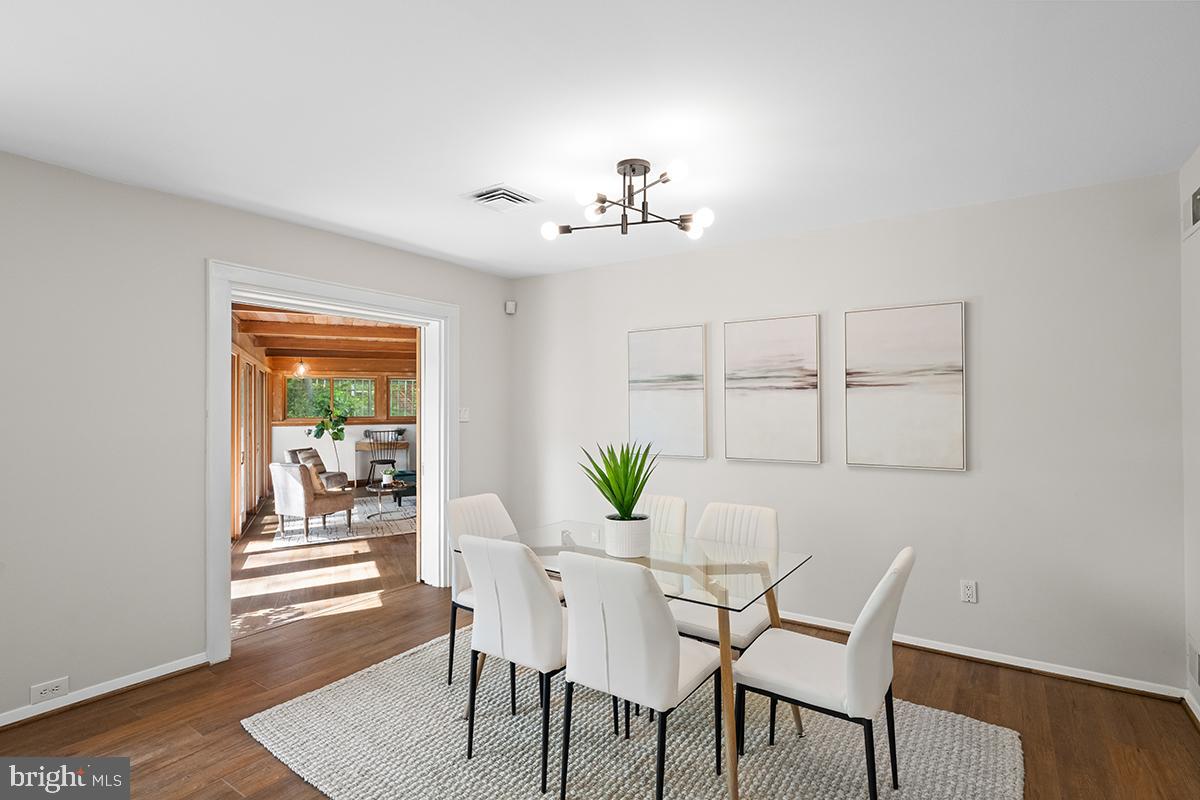 3430 Blair Road Falls Church, VA 22041 - Photo 7 of 40 a view of a dining room with furniture and wooden floor