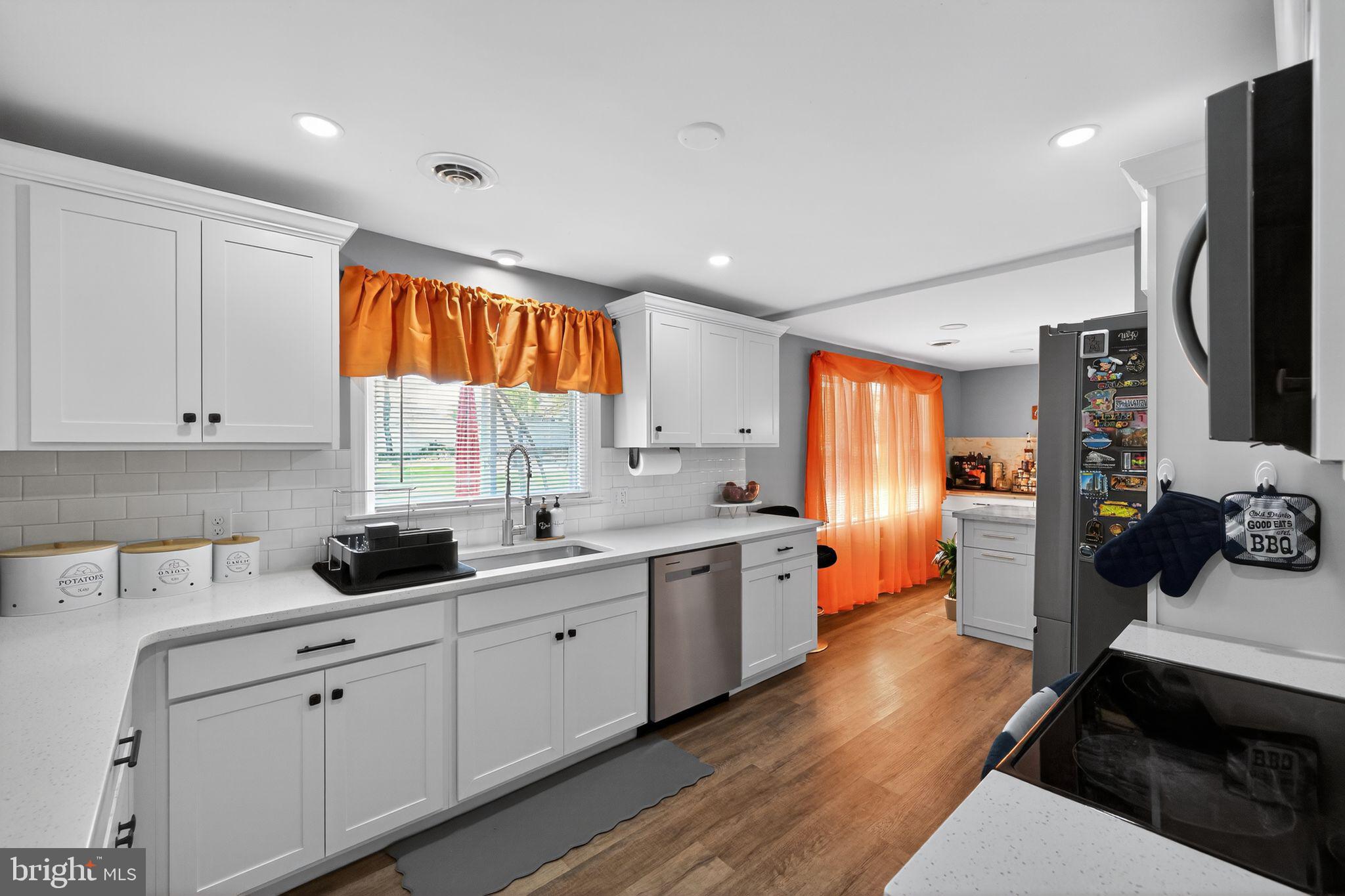 525 Mountain Road Dillsburg, PA 17019 - Photo 11 of 53 a kitchen that has a lot of cabinets a sink and appliances in it