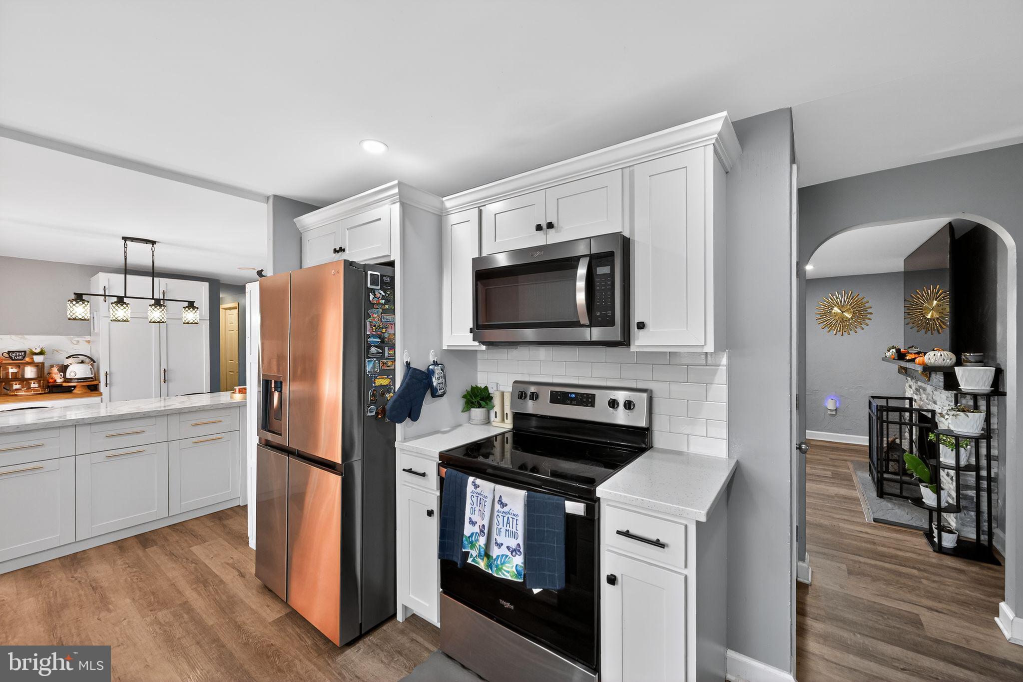 525 Mountain Road Dillsburg, PA 17019 - Photo 12 of 53 a kitchen with stainless steel appliances a refrigerator stove and microwave