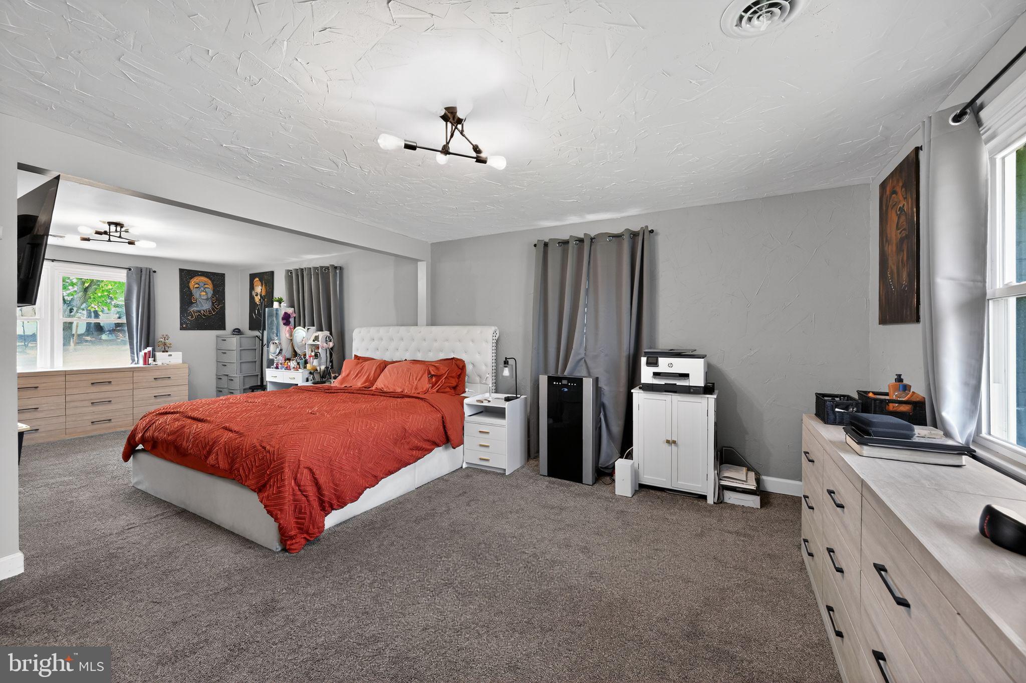 525 Mountain Road Dillsburg, PA 17019 - Photo 22 of 53 a bed room with a bed and a television