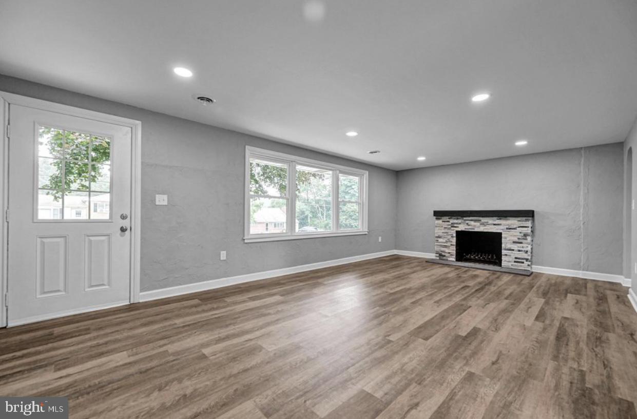 525 Mountain Road Dillsburg, PA 17019 - Photo 32 of 53 an empty room with windows and fireplace