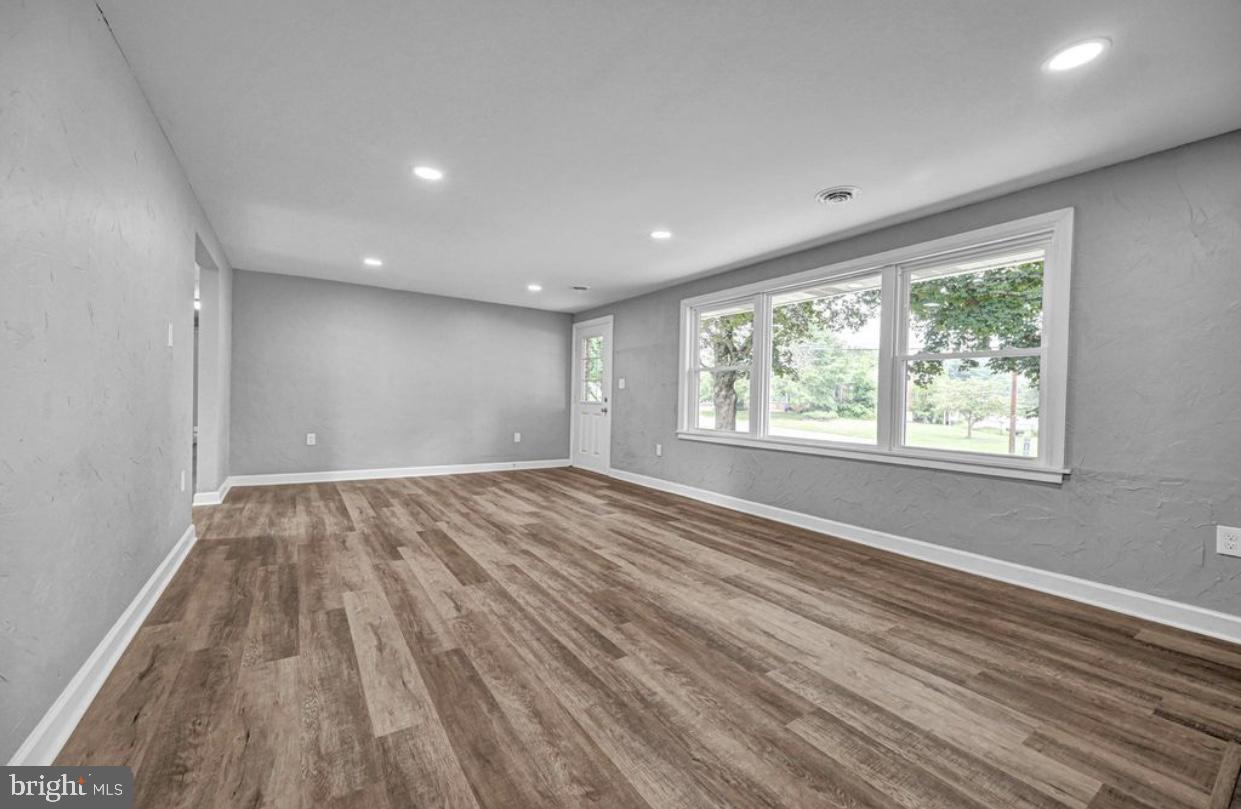 525 Mountain Road Dillsburg, PA 17019 - Photo 33 of 53 a view of empty room with wooden floor and fan