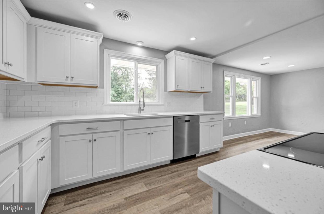 525 Mountain Road Dillsburg, PA 17019 - Photo 34 of 53 a kitchen with white cabinets appliances and a window