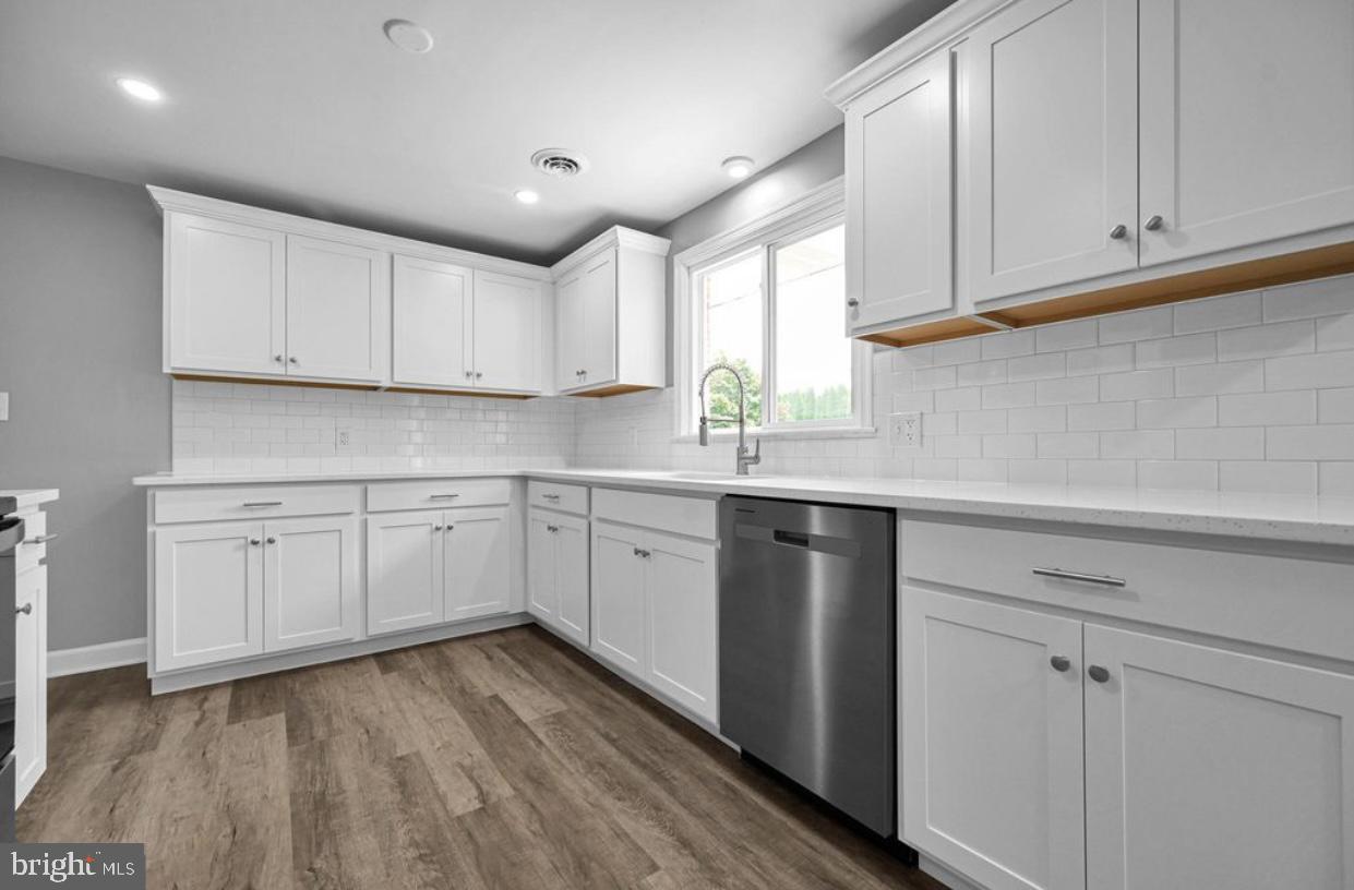 525 Mountain Road Dillsburg, PA 17019 - Photo 37 of 53 a kitchen with cabinets appliances a sink and a window