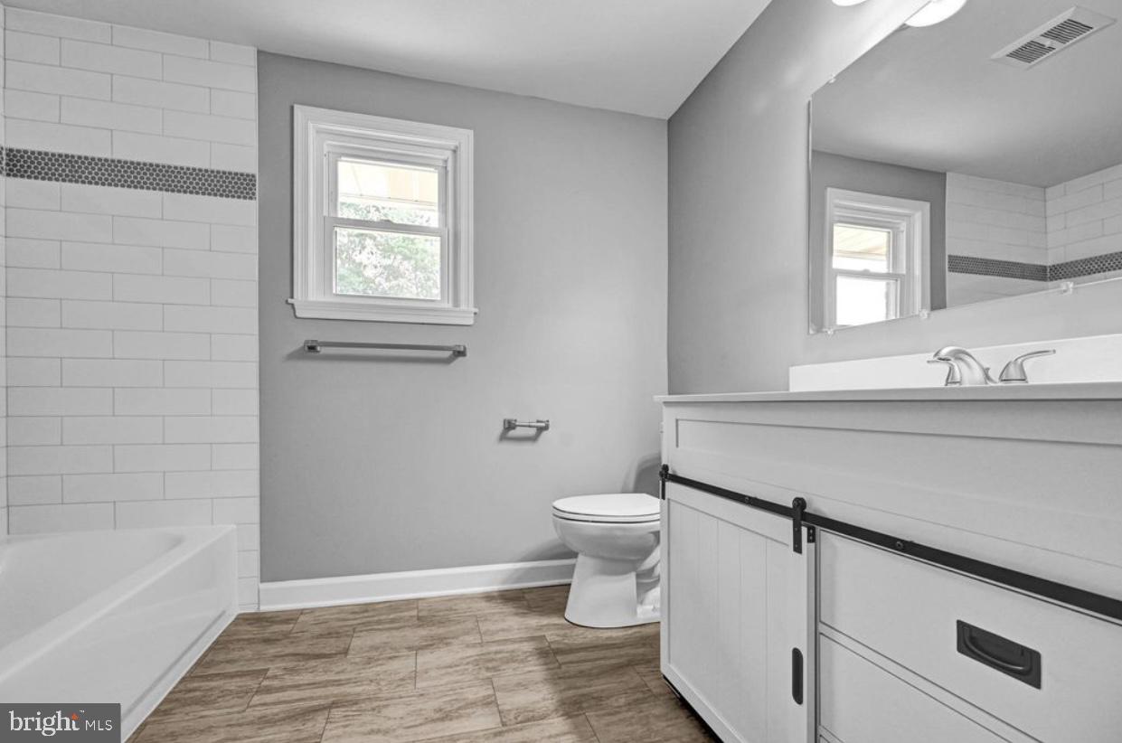 525 Mountain Road Dillsburg, PA 17019 - Photo 41 of 53 a bathroom with a sink a toilet and bathtub
