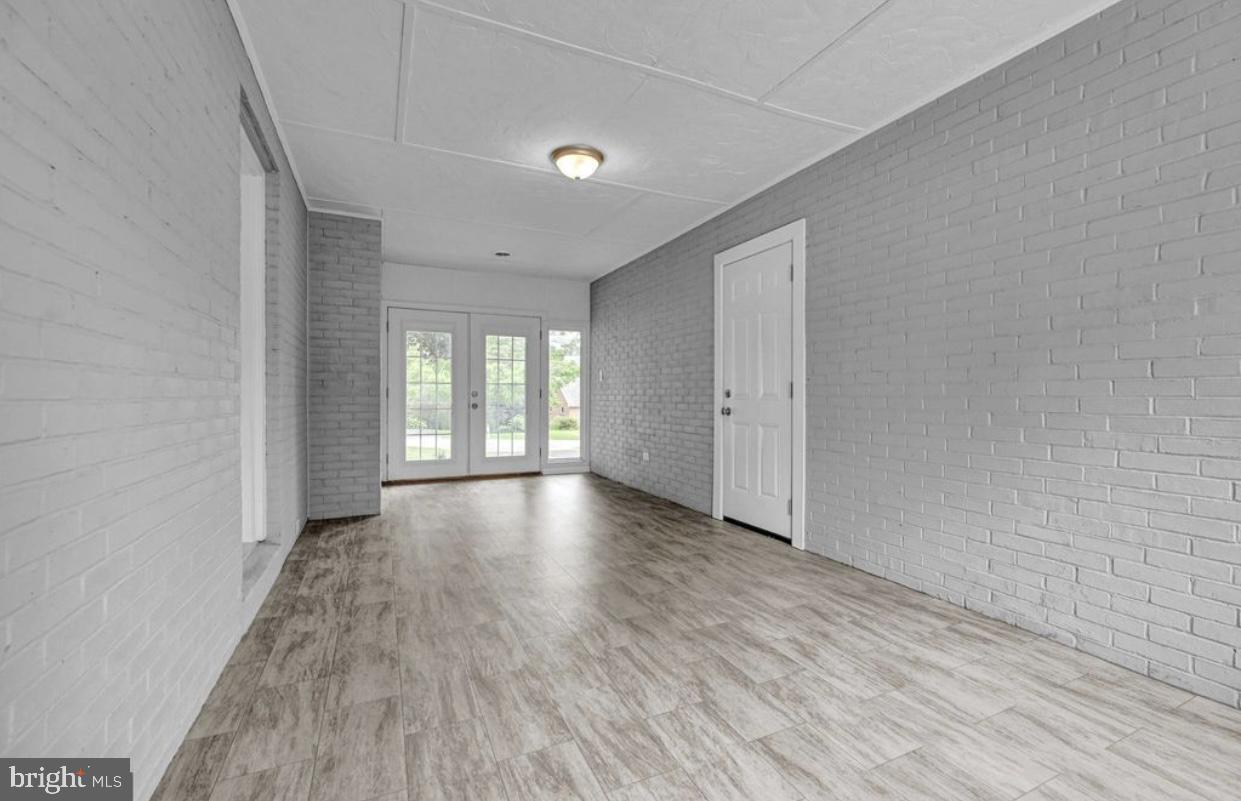 525 Mountain Road Dillsburg, PA 17019 - Photo 48 of 53 a view of an empty room with wooden floor and fan